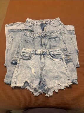 Lot of 3 size 28 clothes. 1 pair shorts, 2 pair of flare, wide leg jeans